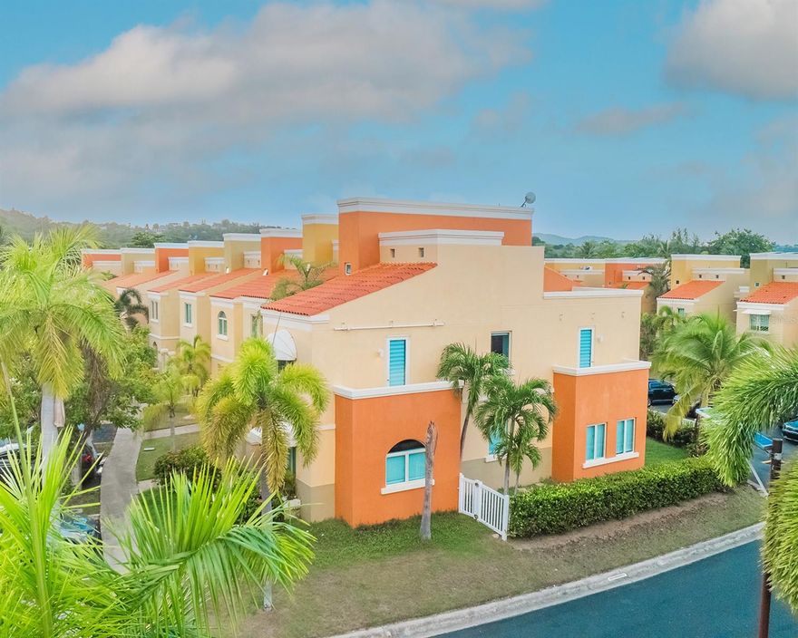 Welcome to Aquabella 84, a desirable corner-unit townhome located within the sought-after Palmas del Mar resort community. Offering added privacy, natural light, and a functional multi-level layout, this residence is ideal for full-time living, a vacation retreat, or an investment opportunity (only long-term rental approved).

The property features 3 bedrooms plus an additional bonus room on the top floor, providing flexible space for a home office, guest room, media room, or play area. The open living areas are designed for comfortable everyday living and entertaining, while the corner location enhances the sense of space and privacy.

Residents of Aquabella enjoy access to excellent community amenities, including guard-gated access, fitness center, playground, and dog park, all within a beautifully maintained setting.

Located in Palmas del Mar, owners also benefit from proximity to beaches, marina, golf courses, tennis and pickleball courts, restaurants, shops, and more—offering the best of resort-style Caribbean living.