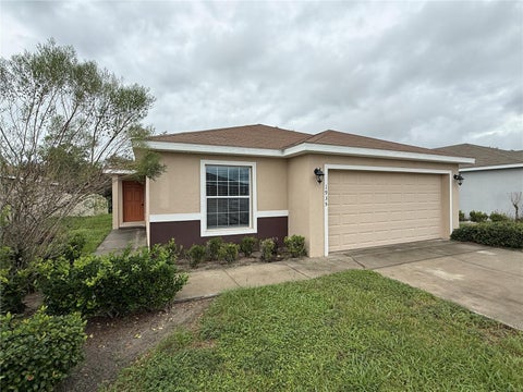 Photo of 1935 Bretton Ridge Drive, Winter Haven, FL 33884 (MLS # O6448732)