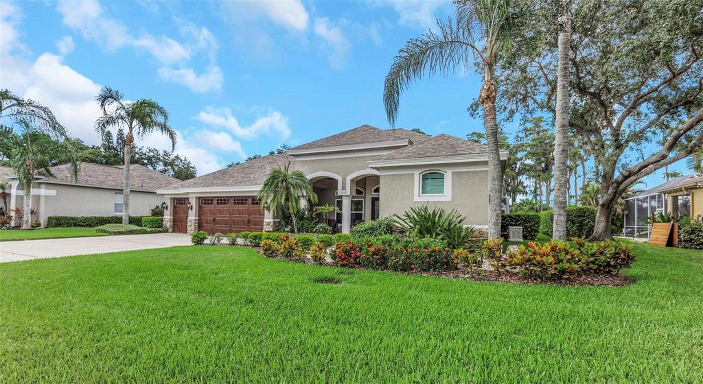 Photo of 1402 Wyndham Lakes Drive, Odessa, FL 33556 (MLS # TB8426420)