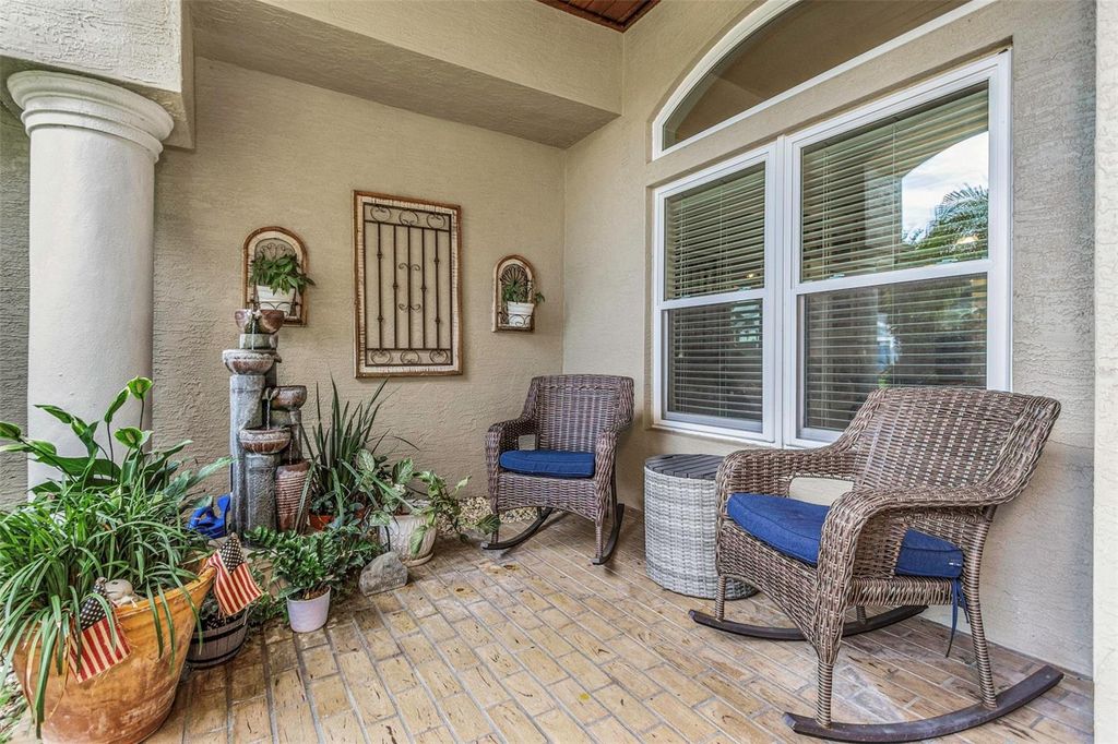 Photo of 1402 Wyndham Lakes Drive, Odessa, FL 33556 (MLS # TB8426420)