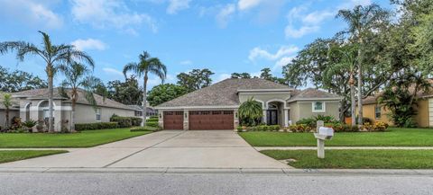Photo of 1402 Wyndham Lakes Drive, Odessa, FL 33556 (MLS # TB8426420)