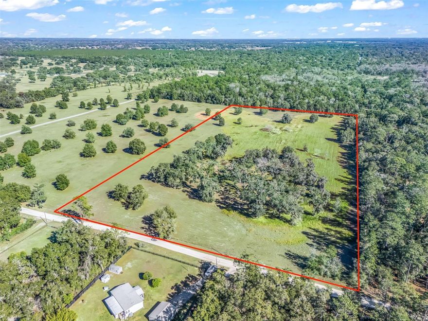 Discover 20.60 acres of prime vacant land in the heart of Marion County, Florida—an exceptional opportunity for horsemen and equestrian enthusiasts. Located just minutes (approximately 5 miles) from the World Equestrian Center and surrounded by established horse training facilities, this fully fenced property is ideally suited for a horse farm or equestrian estate. The land features majestic Granddaddy oak trees providing natural beauty and shade, a picturesque small pond, and electric already installed. Peaceful, private, and perfectly positioned in Florida’s renowned horse country, this property offers endless potential to build barns, arenas, and a custom farm setup while enjoying the tranquility of the countryside with close proximity to world-class equestrian amenities. Fence  , electric and water  well is  going to be installed this month.