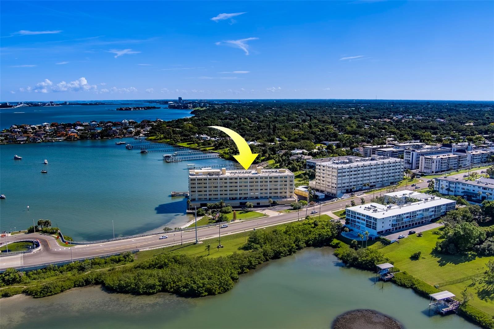Completely Renovated & HGTV-Featured!
Welcome to 100 Bluff View Dr. in the desirable Belleair Bluffs community—where modern luxury meets coastal charm. This stunning 2-bedroom, 2-bath condo has been completely renovated from top to bottom with designer finishes and attention to detail throughout. Enjoy a bright, open-concept floor plan with a gourmet kitchen, spa-style bathrooms, and stylish flooring. Step outside to a serene balcony with a magnificent view of the water, perfect for relaxing or entertaining.
Just featured on HGTV, this home offers the rare opportunity to live in a property showcased for its impeccable design and thoughtful craftsmanship.
Located just over the Belleair Causeway from sugar sand beaches, parks, and local dining; this home is a must-see!