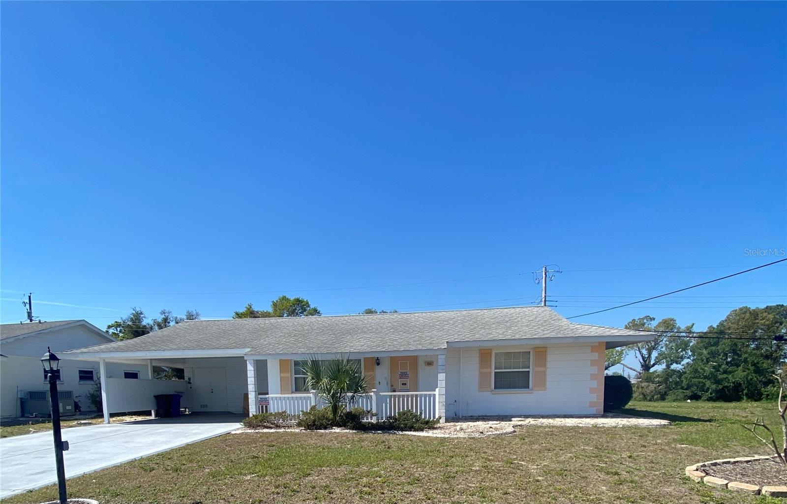 Lovely 2 Bedroom 2 Bath home in a 55+ community with a florida room. In a quiet, peaceful community were you can drive the golf cart everywhere you go within several miles. Fully fenced back yard. Plenty of space from neighbors to one side about 130 feet away and none at back of home. It is a comfortable home with a cover parking, From the carport you can walk right into the kitchen door to unload the groceries. The floors are easy care and durable, no carpet to clean here. Just under a .4th of a mile to Farmacy, bank, hair salon, restaurant and more. This home is fully ready and waiting for you to enjoy.