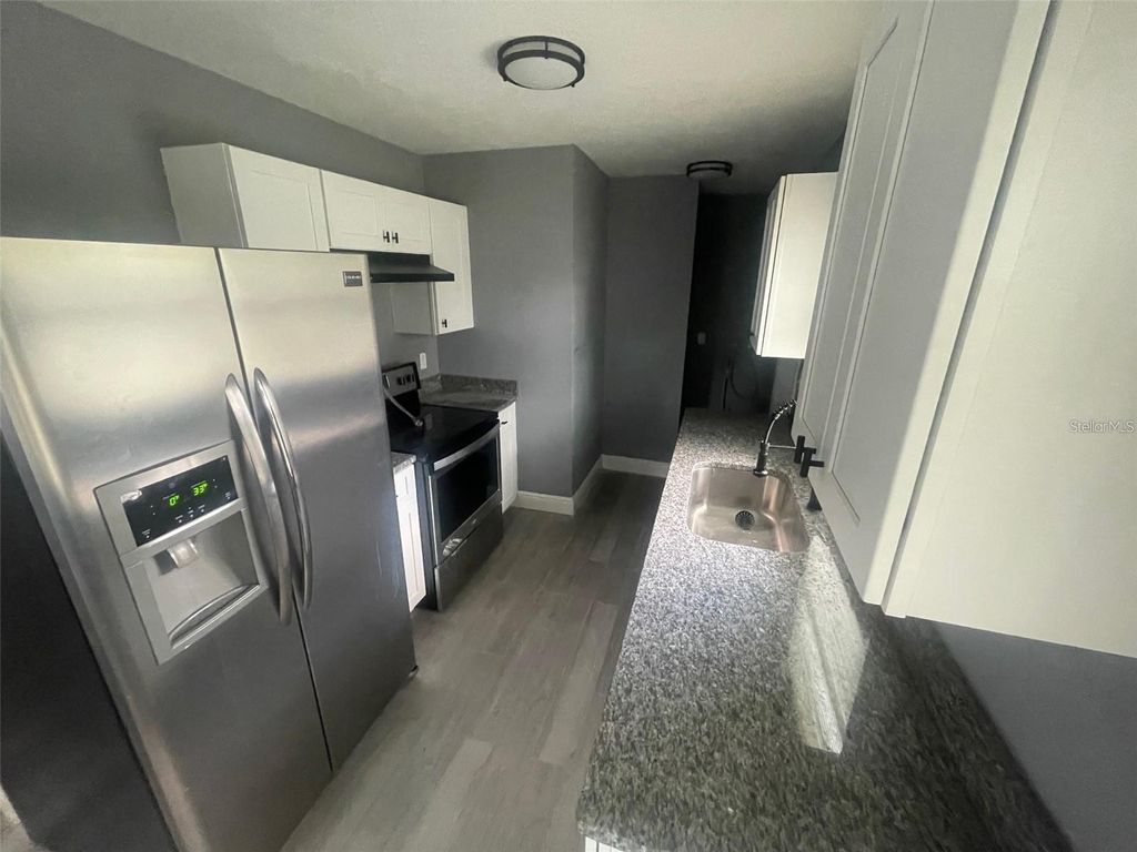 Photo of 830 Wooden Boulevard, Orlando, FL 32805 (MLS # O6352320)