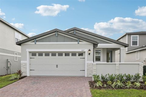 Photo of 607 Pennywort Street, Lake Alfred, FL 33850 (MLS # O6343019)