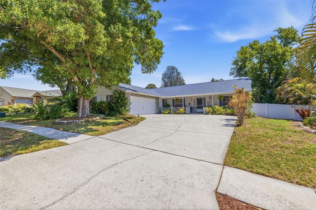 Photo of 4936 Mineola Place, Palm Harbor, FL 34684 (MLS # TB8492336)