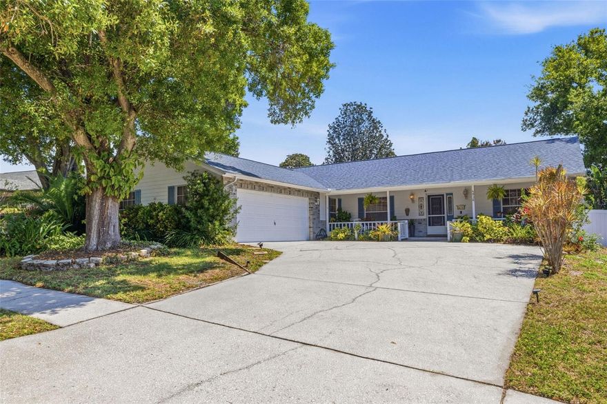 Welcome Home to Florida Living at Its Finest!

This beautifully maintained 3-bedroom + den, 2-bathroom, 2-car garage home offers the perfect blend of comfort, style, and functionality. From the moment you arrive, you’ll be impressed by the exceptional curb appeal, featuring lush tropical landscaping and a charming wide front porch—ideal for relaxing and enjoying the Florida lifestyle.

Step inside to an open-concept floor plan with spacious living and dining areas that flow seamlessly into the kitchen—perfect for both everyday living and entertaining. The kitchen features a breakfast bar and a cozy eat-in dinette area, creating a welcoming space for family and guests.

The thoughtfully designed split-bedroom layout provides privacy, with the primary suite tucked away on one side of the home. The primary bedroom includes a walk-in closet and an en-suite bathroom. On the opposite side, you’ll find two additional bedrooms, a guest bathroom, and a versatile den—ideal for a home office, playroom, or flex space.

Enjoy indoor-outdoor living with a screened lanai, accessible through elegant French doors from the living room, as well as a private entry from the primary suite—perfect for morning coffee or evening relaxation.

Additional highlights include:

New Roof (May 2024)
Updated AC systems (2019 & 2021)
Oversized garage with plenty of room for vehicles, storage, or recreational gear
The community offers wonderful amenities including two scenic lakes, a fishing pier, and a playground. Conveniently located just a short drive to restaurants, shopping, golf courses, movie theaters, and Florida’s beautiful beaches.

This is more than a home—it’s your slice of paradise!