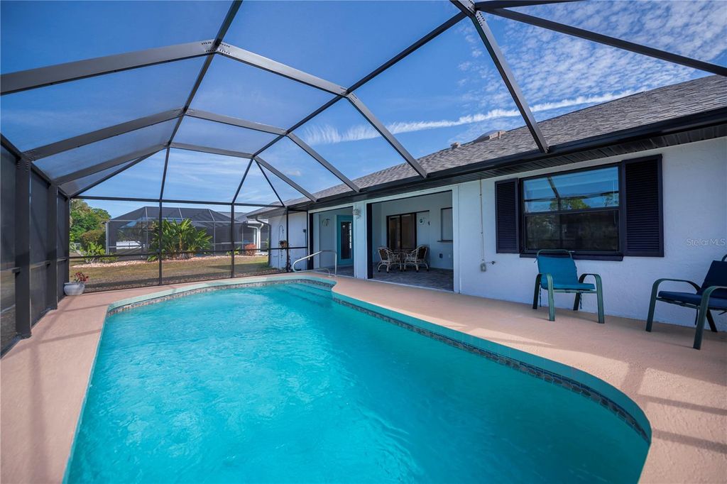 Photo of 1197 Dorchester Street, Port Charlotte, FL 33952 (MLS # C7519528)