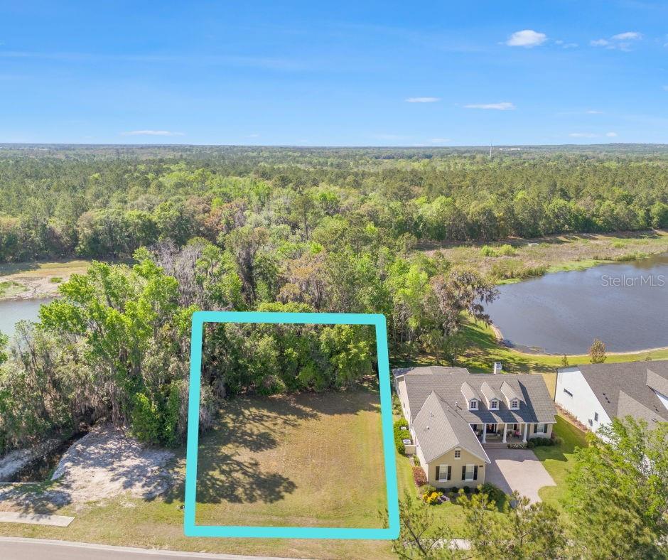 Over 1/4 acre lot in Southern Hills on a conservation! Privacy is abundance here with no rear neighbors. You can choose any builder you would like and build a custom home on this property! This beautiful lot is just 1 block from most of the community amenities and the front gate. Super quick and easy access in and out of the community from your driveway! Southern Hills is an entire lifestyle with a prestigious 18 hole Golf Course, 2 restaurants, 2 bars, a clubhouse, a resort style pool, a full gym, a Pro Shop, and so much more!