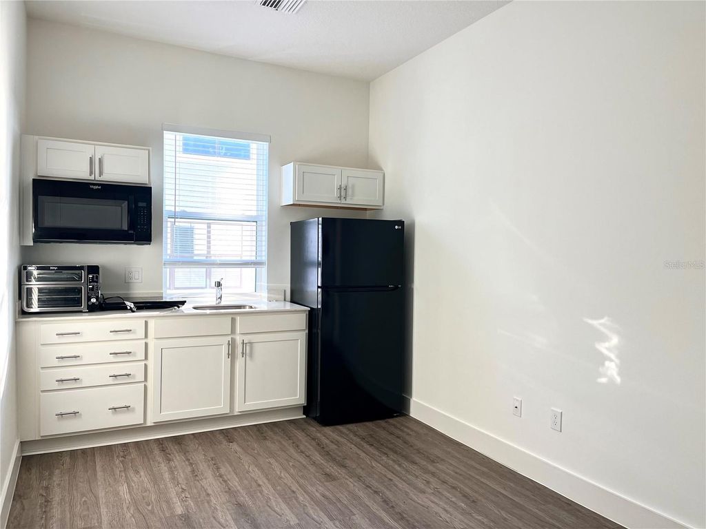 Photo of 13037 Michael Callin Alley, Orlando, FL 32828 (MLS # O6370184)