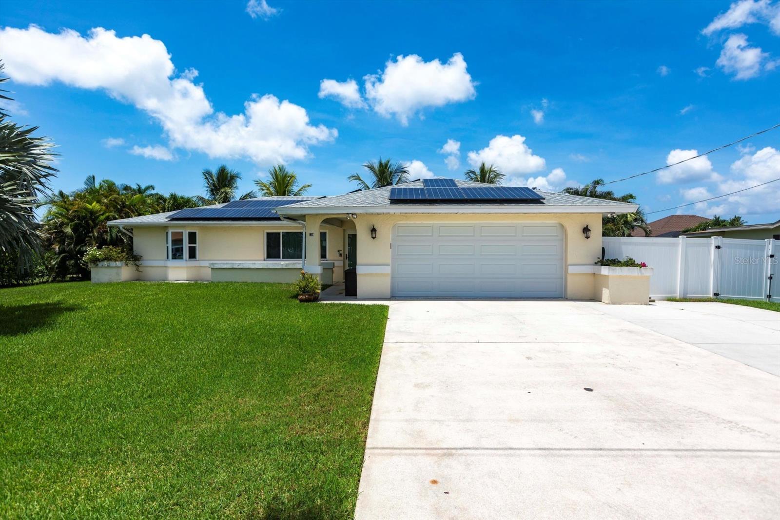 Welcome to your dream waterfront retreat! This move-in ready, direct sailboat access pool home offers 100 feet of seawall, dock power for larger boats, and working davits, just minutes from open water. Recently upgraded, the home features HIGH IMPACT Doors and windows, new granite countertops, stainless appliances, solid surface flooring, and beautifully renovated bathrooms. The solar panels offer outstanding energy savings, while the newly constructed lap pool provides a private space for fitness and relaxation. Brand new sod enhances the curb appeal, setting the stage for lush Florida living. The split-bedroom layout includes a spacious master suite with walk-in closet and ensuite bath, an eat-in kitchen with breakfast bar, and light-filled living and dining areas. NO HOA restrictions! Located in a peaceful, non-gated community close to beaches, top-rated schools, shopping, and dining. Whether you're looking for a personal paradise or an income-generating investment, this affordable waterfront gem checks all the boxes. ROOF is 2018 & HVAC is 2020.