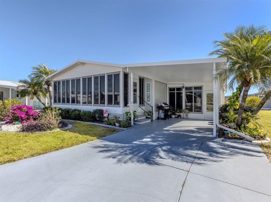 This immaculate, extremely well maintained 2 bedroom, 2 bath home is located in the land owned, pet friendly community of Harbor Isles and truly shows pride of ownership. Clean as a whistle and updated from top to bottom, this home is completely move-in ready. Pergo flooring runs throughout, all walls have been freshly textured and painted, and all exterior windows have been updated for peace of mind.
The home features two spacious lanais, both enclosed with sliding acrylic windows, custom blinds, and window AC units, creating comfortable year-round spaces to relax or entertain. The kitchen has been tastefully updated with new counters, a refreshed backsplash, and newer stainless steel appliances. Major improvements include a full re-pipe in 2021, a new roof in 2023 with a 15-year transferable warranty, a 5-year-old AC unit, vapor barrier installed in October 2023, hot water heater replaced in 2022, new vinyl skirting in 2024, and a brand new carport in 2025.
The shed offers a convenient laundry area, ample storage, and is cooled by its own window AC unit. The home is being offered partially furnished, making it an easy transition for its next owner.
Harbor Isles is a highly sought-after, gated waterfront community offering a resort-style lifestyle. Residents enjoy a marina with boat slips and kayak launch, a clubhouse with a wide variety of social activities, a heated pool, tennis and pickleball courts, bocce, shuffleboard, a fitness center, and an active calendar of events. Conveniently located near beaches, shopping, dining, and downtown Venice, Harbor Isles is known for its friendly atmosphere and beautifully maintained grounds.