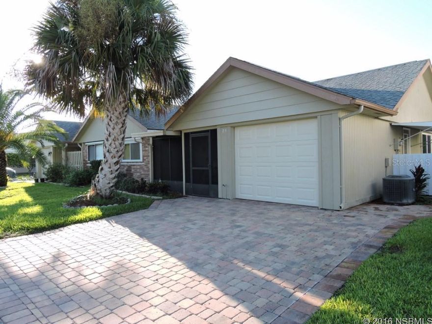 Well maintained golf villa features updated, and open custom kitchen with island, cabinets, counter tops  and appliances all new in 2004. Open floor plan leads to Florida room that is accessed by way of French doors, both from living area and from master suite, for flexible use of this 2nd living area, providing private space or flowing  living space. New windows, A/C system 5 years new, double wide paver driveway and 1 car garage,  storm shutter system, awnings. Wind rated windows in Florida room.  Both bathrooms have updated cabinets and hard surface counters. Private back yard with lush landscaping. Ready to move into, a pleasure to show. Low, Annual H.O.A. dues provide you with termite bond, sprinkler system and water to it, and Cable TV. Community heated pool is available through separate and optional membership. Nestled between 2 golf courses, central location is close to everything, minutes to beach. ;Water: City