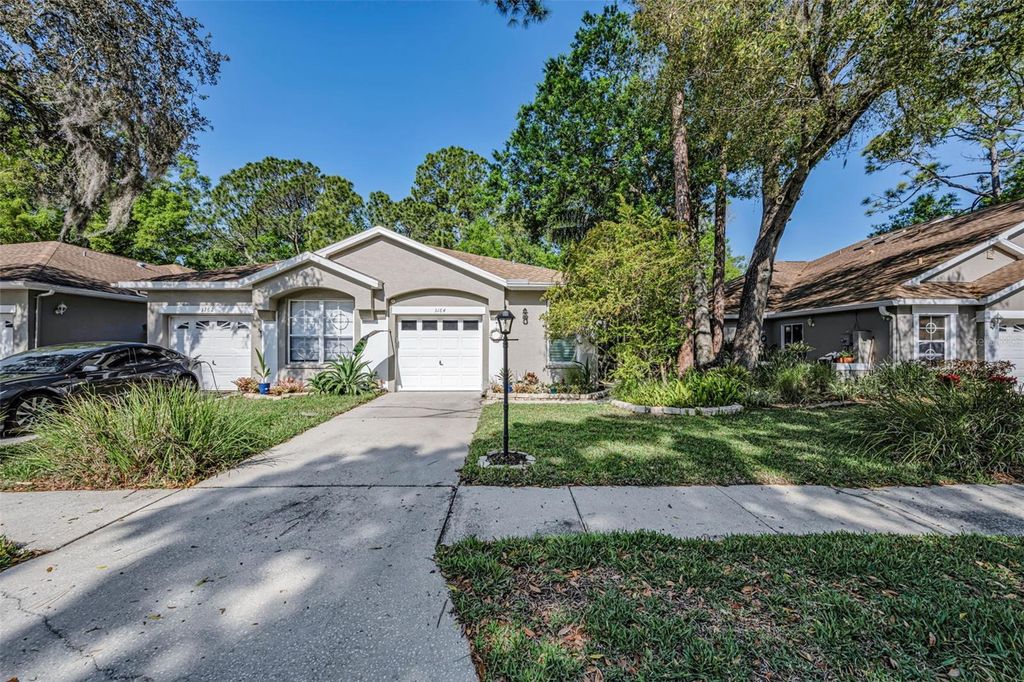 Photo of 3164 Brooker Creek Way, Palm Harbor, FL 34685 (MLS # TB8486837)