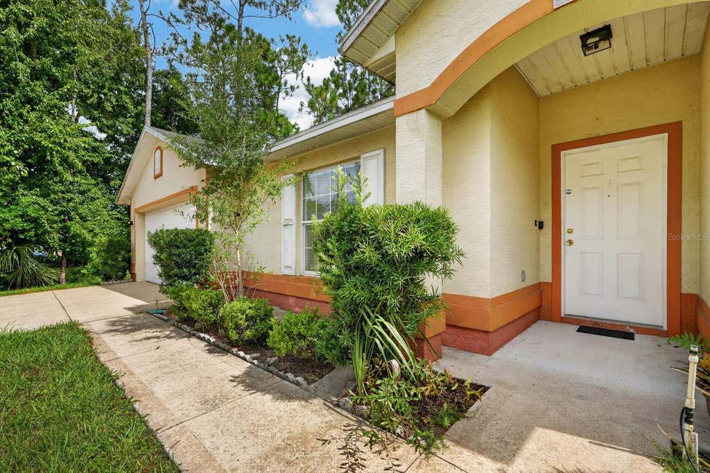 Photo of 25 Rymshaw Drive, Palm Coast, FL 32164 (MLS # V4950567)