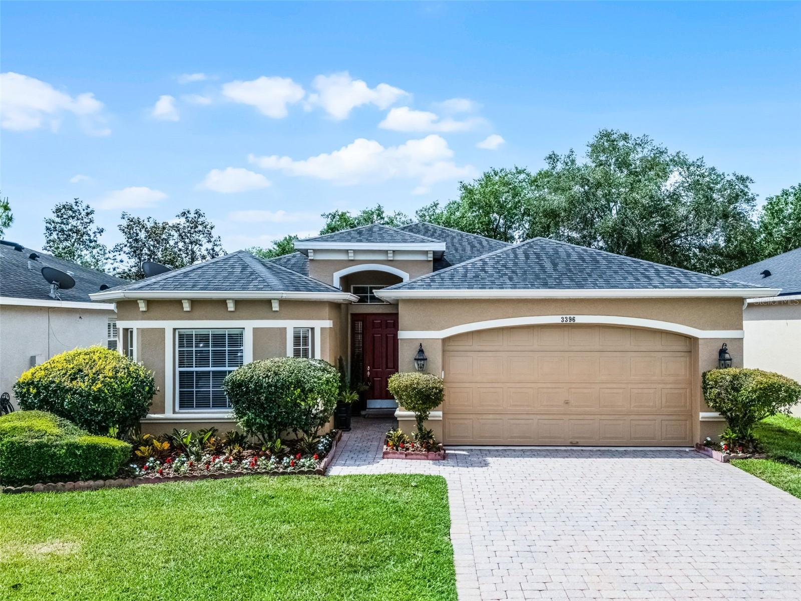 One or more photo(s) has been virtually staged. You can STOP searching! This is the one you’re looking for. --- BACK ON THE MARKET: A change of heart for a larger home is an *opportunity* for you! --- Located in Oviedo’s highly desirable Sanctuary community, this *LEGIT MOVE-IN-READY* home features a *expansive*, *open concept* floor plan with 3 bedrooms, 2 bathrooms, over 1,800 square feet of thoughtfully designed single-story living, and a two-car garage. --- CURB APPEAL: The curb appeal is instantly inviting with *striking* landscaping, a brick paver driveway, and mature trees creating a welcoming first impression. Step inside to find *luxury vinyl* plank flooring installed throughout the entire home in 2022, blending style with low-maintenance durability. *Vaulted ceilings*, large windows, and updated lighting fixtures give the home a bright and airy feel. --- KITCHEN: The kitchen is the heart of the home, featuring *granite* countertops, a breakfast bar, 42" upper cabinets, *stainless* steel appliances, and a layout that flows seamlessly into the dining and living areas, making entertaining and everyday living a breeze. Just off the main living area, sliding glass doors lead to a screened lanai overlooking the backyard with no rear neighbors and room to relax, garden, or play. --- PRIMARY SUITE: The owner’s suite is a retreat of its own with a tray ceiling, garden views, and a spacious en-suite bath complete with dual *granite* vanities, a soaking tub, a walk-in shower, and private water closet. The split-bedroom layout ensures privacy, with two secondary bedrooms and a full guest bath located on the opposite side of the home from the master. --- UPDATES & MAINTENANCE: Recent updates include a new hot water heater (2025), a newer roof (2015), HVAC system (2013), and the interior painted in 2022. A clean four-point inspection and wind mitigation report are available upon request, and a one-year American Home Shield *home warranty is included* for added peace of mind. The home has been *professionally cleaned * from top to bottom, including all windows inside and out, and a *PRE-LISTING INSPECTION* completed with all recommended repairs and maintenance done. --- BACK YARD: A roomy screened-in patio oversees this cozy, well landscaped, and private back yard. Landscaping, a brick wall, and 50 feet of right-of-way makes CR-419 *whisper quiet*. EXTERIOR ENHANCEMENTS: Exterior improvements include fresh landscaping, irrigation system serviced, power washing of the walkways, driveway, and rear wall, stucco repair and touch-up paint, and window repairs — all performed by licensed contractors for a truly *turnkey* experience. --- COMMUNITY AMENITIES: Located in the amenity-rich Sanctuary community, residents enjoy a resort-style clubhouse, pool, splash pad, fitness center, tennis and basketball courts, and playgrounds, plus wide sidewalks and natural green spaces that make daily walks a pleasure. --- AREA HIGHLIGHTS: Zoned for top-rated Seminole County schools – Walker Elementary, Lawton Chiles Middle and Hagerty High, and quick access to SR 417, UCF, Research Park, Oviedo on the Park, Waterford Lakes, and outdoor recreation areas, this home offers a *prime location* that blends suburban tranquility with convenient access to everything Central Florida has to offer. If you're searching for a well-maintained, *modern* home that’s truly *turnkey*, this is the one—schedule your showing today and experience the best of Oviedo living at 3396 Gerber Daisy Ln.