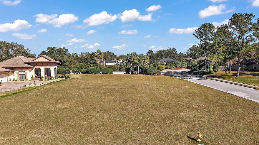 Build your dream home on this large corner lot in the Beautiful Gated Community of Harbor Hills.  BRING YOUR OWN BUILDER!  Gated Country Club community with the option of Club House, Golf Membership, fitness center and spa, junior Olympic size swimming pool, tennis and pickle ball courts and restaurants for an additional fee. Community is located on the shores of one of the most sought after freshwater lake with access to the Harris Chain of Lakes and the St Johns River. Community features its private Marina, dock and boat ramp. Join the boat club with its many activities including fishing tournaments, lighted boat parade and much more. Community is located just a short drive away to The Villages with its many restaurants, shopping, movies theaters, nightly entertainment and much more. Numerous doctors as well as a VA outpatient clinic and the Villages Regional Hospital all within just a short drive. With all this community and the surrounding areas provide this is truly the place to call home and start living the true Florida Lifestyle. Call to make an appointment today and see this beautiful community for yourself... you will not be disappointed!All information recorded in the MLS is intended to be accurate however, it should be independently verified by buyer and their agent.