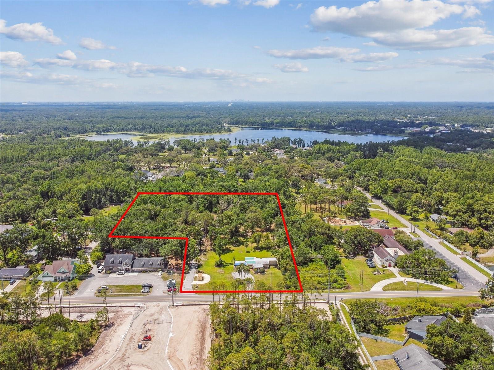Prime 5.8 +/- Acre Property in the Heart of Lutz – Exceptional Development or Family Estate Opportunity. Positioned just 1/3 mile from US-41 and offering 256 feet of road frontage, this secluded paradise blends the best of both worlds—peaceful privacy surrounded by nature, yet conveniently located with easy access to I-275 and downtown Tampa. Zoned ASC-1, this property allows for one home per acre, making it an exceptional canvas for a luxury home development or a spacious custom-built family estate. With multiple upscale residential projects along Sunset Ln, this location is rapidly becoming one of Lutz’s most desirable addresses for high-end living. Whether you're a developer with a vision, or a homeowner seeking the perfect setting for your family's legacy estate, this property offers unmatched potential. Enjoy the freedom of NO HOA restrictions, and create a lifestyle that’s both tranquil yet connected. Don’t miss out on this rare gem, call for your private showing today.