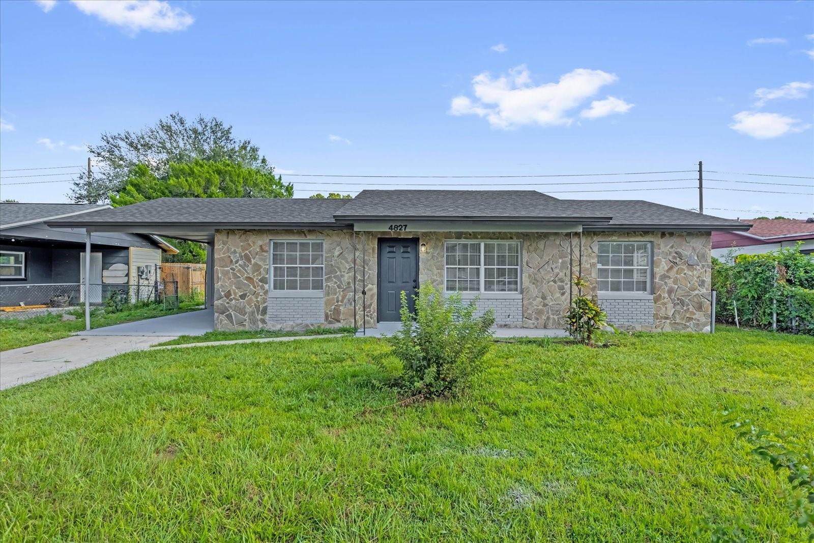 Beautifully renovated with attention to detail! This 3-bedroom, 2-bath home is ready for immediate occupancy! This property features a Brand-New Roof and A/C. Stunning Calacatta Gold Quartz waterfall countertop, and a Fully Updated kitchen with New stainless steel appliances. Range, Refrigerator, Microwave, and Dishwasher. Additional upgrades include a New Tankless Water Heater, fresh paint inside and out, modern vanities, New flooring, and baseboards throughout. The spacious inside utility room adds extra convenience. Step outside to a huge fenced backyard with no rear neighbors, offering privacy and plenty of room for entertaining, pets, or play. A sliding glass door off the kitchen provides easy access to the outdoors for seamless indoor-outdoor living. Located in a great area, this move-in-ready home combines modern updates, style, and comfort—all in a fantastic location. Don’t miss out on this opportunity!