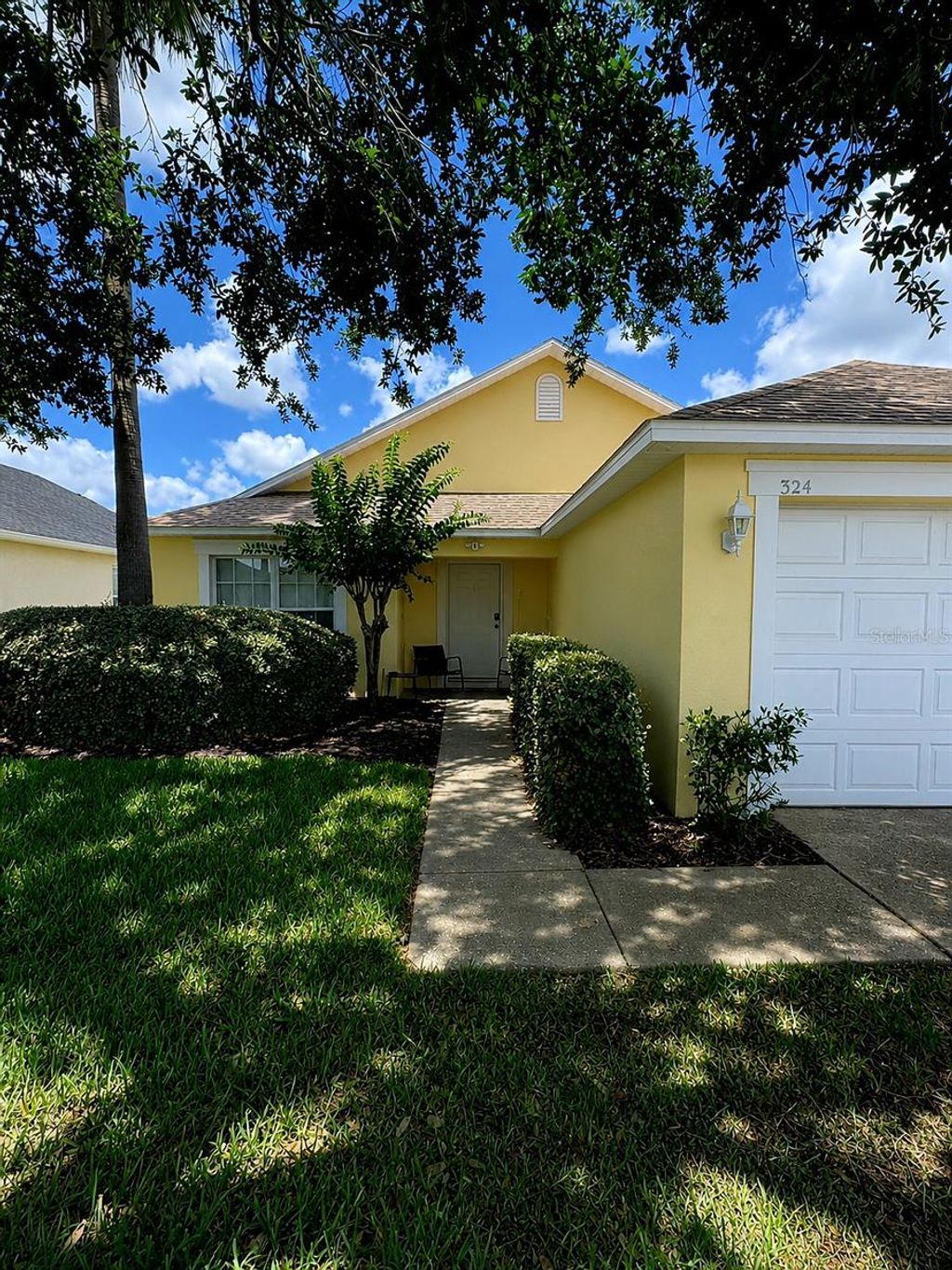 Photo of 324 Casterton Circle, Davenport, FL 33897 (MLS # O6428973)