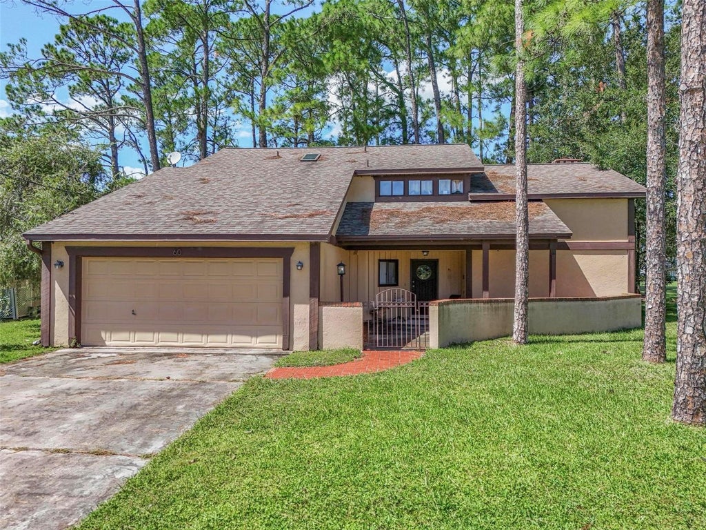 Photo of 60 Westfield Lane, Palm Coast, FL 32164 (MLS # FC321821)