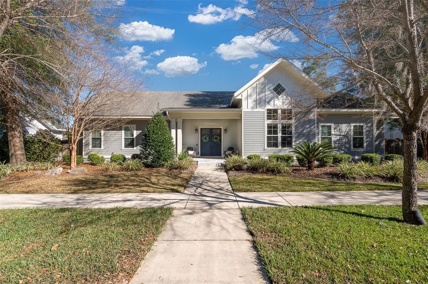 Stunning Former PARADE HOME built by Dibros Design and Construction, featuring 4 BRs, 3 BA PLUS STUDY/FLEX gracefully situated on a premier PRIVATE homesite with one of the largest backyards in Town of Tioga! This thoughtfully designed traditional home showcases upscale finishes and refined craftsmanship throughout, including a chef-inspired gourmet kitchen with an expansive working island, stainless steel appliances, granite countertops with quartz island, and custom wood cabinetry complemented by a walk-in pantry. Elegant architectural details include tongue-and-groove wood ceilings in the dining room and soaring vaulted ceilings in the family room and study. Luxury Vinyl Plank flooring span most of the home and primary and the entire home boasts designer accents while abundant windows create a light-filled, sophisticated living environment. The luxurious primary suite offers a private sitting area and generous closet space with two large walk-in closets with built in shelving. The primary bathroom is equally luxurious with freestanding tub, large glass shower and long double vanity. Outdoor living is elevated with an expansive covered back porch and a spacious, privacy-fenced lot—ideal for entertaining or relaxing in comfort and style. A truly exceptional home offering timeless elegance, quality construction, and upscale living. Town of Tioga is a popular community in the Jonesville/SW Gainesville area and offers a one of a kind lifestyle with proximity to the Tioga Town Center restaurants and shopping, walking trails and a stellar amenity package including clubhouse, pool, playground, two tennis courts, basketball court and beach volleyball! Top rated school zones: Meadowbrook Elementary, Kanapaha Middle and Buchholz High. Enjoy lower utility bills with Clay Electric Co-op for electricity and GRU for natural gas/water.