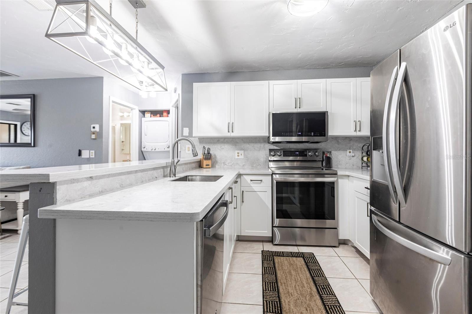 Discover your slice of paradise in this beautifully furnished 2-bedroom, 2-bathroom condo in the heart of the serene Deep Creek Gardens community in Punta Gorda, FL! Nestled on the second floor, this 860 sq. ft. gem offers stunning lake views from your private screened-in balcony—perfect for morning coffee or evening sunsets.
Step inside to an open-concept living space with ceramic tile flooring throughout, creating a bright and airy ambiance. The modern updated kitchen boasts stainless steel appliances, ample cabinetry, and a convenient breakfast bar, ideal for casual dining or entertaining. Both bedrooms feature walk-in closets, and the master suite includes an en-suite bathroom for added privacy. Enjoy the convenience of in-unit laundry and peace of mind with hurricane shutters on all windows and the lanai.
Deep Creek Gardens offers resort-style amenities at an unbeatable value. Dive into the heated community pool, challenge friends to a match on the tennis or pickleball courts, or enjoy bocce ball, shuffleboard, and a putting green. The newly refurbished clubhouse and lakeside gazebo with grilling station are perfect for gatherings with neighbors or family.
Located just minutes from Charlotte Sports Park, home of the Tampa Bay Rays spring training, and a short drive to the vibrant Historic Downtown Punta Gorda, Sunseeker Resort, and Fishermen’s Village, you’ll enjoy waterfront dining, boutique shopping, and endless entertainment. Outdoor enthusiasts will love the proximity to world-class fishing, Gulf beaches, and easy access to I-75 for quick trips to Englewood or Venice beaches.
This condo is perfect for year-round living, a seasonal retreat, or a savvy investment opportunity with great rental potential. Embrace the laid-back Florida lifestyle in this tranquil lakeside haven—schedule your showing today and make this charming condo your new home!