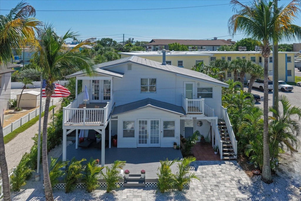 Photo of 115 99th Avenue, Treasure Island, FL 33706 (MLS # TB8558801)