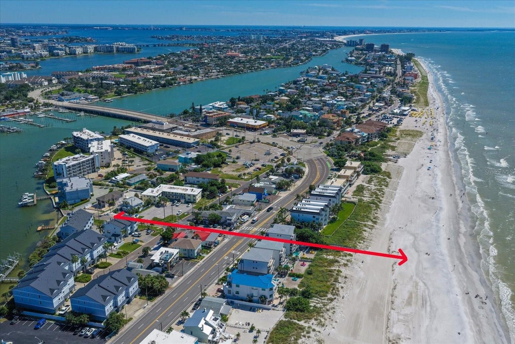 Photo of 115 99th Avenue, Treasure Island, FL 33706 (MLS # TB8558801)
