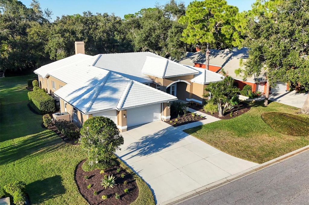 Photo of 8576 Woodbriar Drive, Sarasota, FL 34238 (MLS # A4674889)