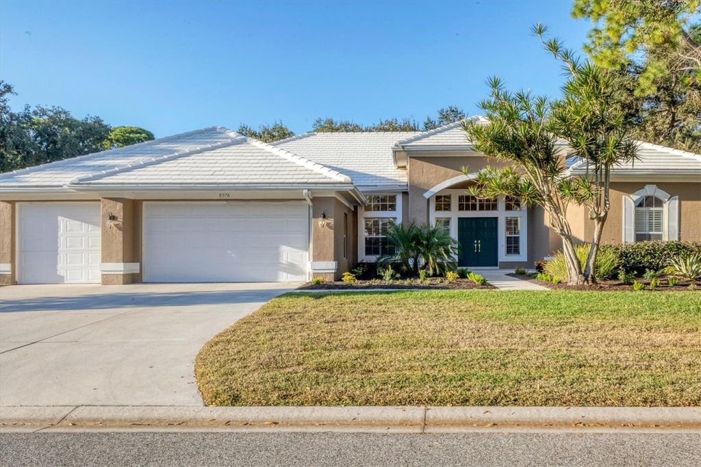 Photo of 8576 Woodbriar Drive, Sarasota, FL 34238 (MLS # A4674889)