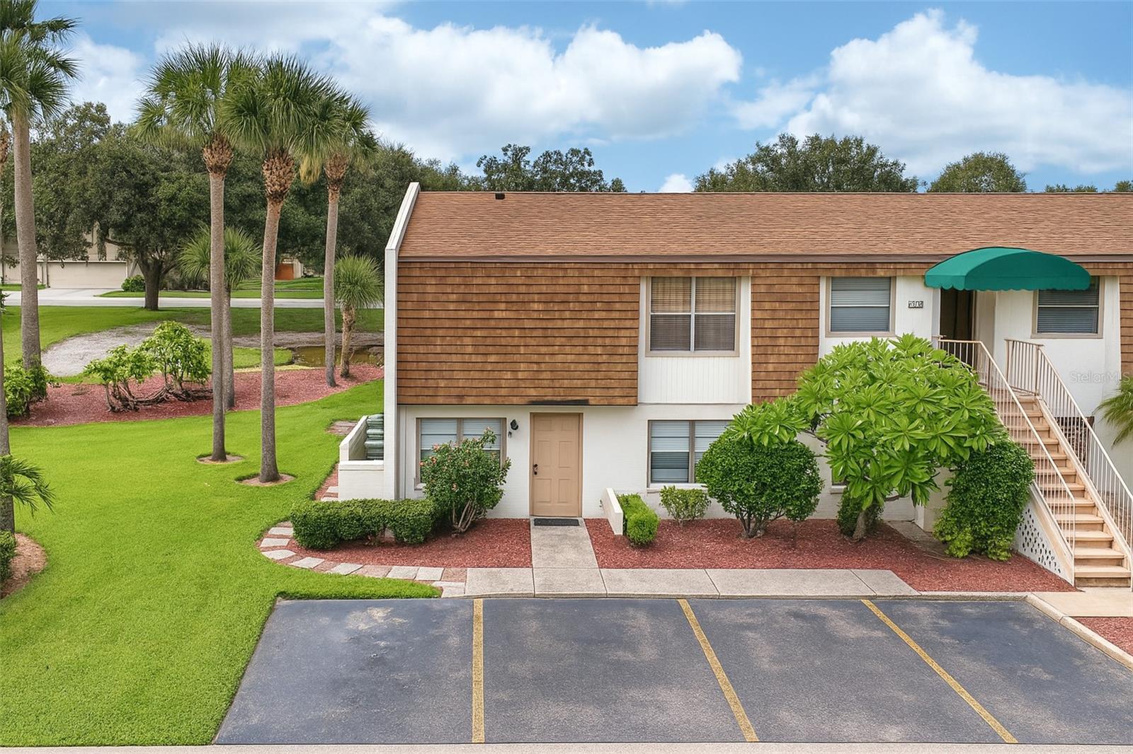 Affordable home ownership begins here in the heart of Mulberry’s Fuller Heights community! This ground-floor end-unit condo offers no upstairs neighbor and only one shared wall, giving you rare peace and privacy at a budget-friendly price. With 2 bedrooms, 1 bath, and approximately 662 sq ft, this first-floor unit is perfect for buyers looking to own without renting.
Completely updated in 2022, the unit features new cabinets, a seated walk-in shower, HVAC and water heater, modern appliances, a programmable keypad door lock, fresh paint, fans, lighting fixtures, and a deep basin sink. The open layout includes bar top kitchen seating, ample cabinets and pantry space, walk-in closets, and a tray ceiling in the living room opening to sliding glass doors with tranquil water views.
Enjoy maintenance-free living—your HOA covers lawn & landscape care, trash removal, pest control, pool and hot tub access, and cable-ready infrastructure. High-speed internet, including fiber-optic service, is also available—perfect for remote work or streaming.
This well-maintained, move-in-ready home combines convenience and comfort, located close to shopping, dining, and major highways with easy access to Lakeland, Plant City, and Tampa.
Ideal for first-time buyers, downsizers, or investors seeking a low-cost entry point with strong rental appeal. Don’t miss this rare opportunity to own a peaceful, private first-floor condo for less than most rentals—schedule your showing today.