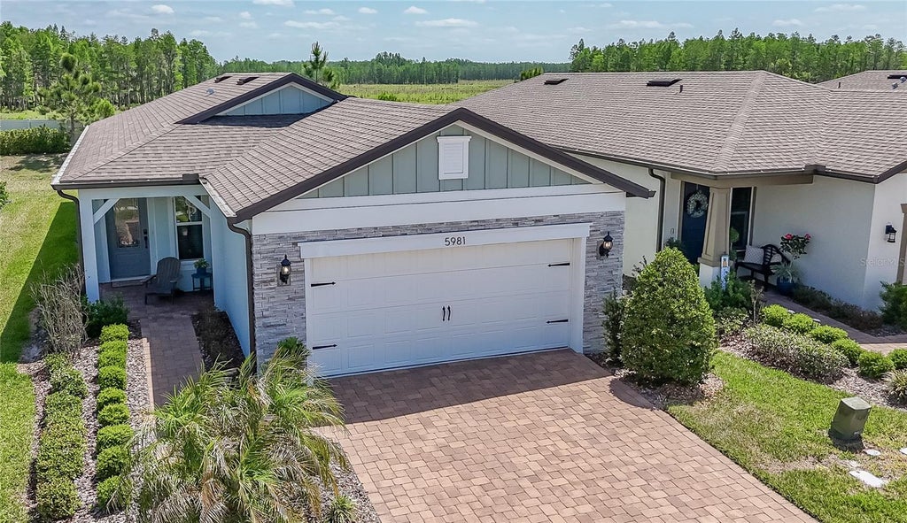 Photo of 5981 Shorebird Branch, Land O Lakes, FL 34638 (MLS # TB8552131)