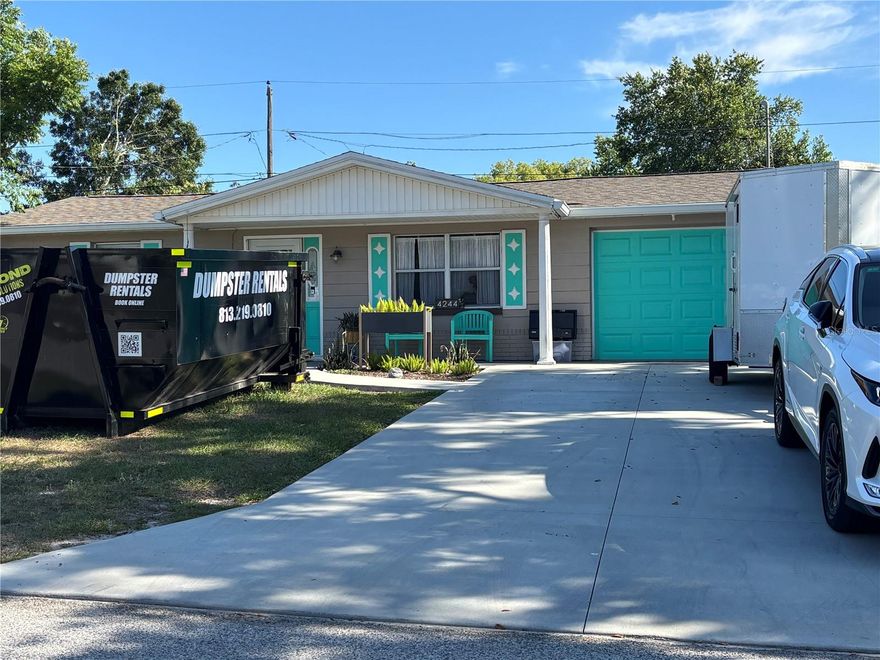 **NO HOA**NO FLOOD ZONE** This beautifully updated 2-bedroom, 1.5-bath home in Holiday, Florida offers modern comfort with thoughtful upgrades throughout. Step inside to find a bright, refreshed interior featuring updated finishes, a clean, contemporary feel, and a layout that makes the most of every square foot. The home includes two well-sized bedrooms and a full bathroom inside, plus the added convenience of a half bath located in the one-car garage—perfect for guests, outdoor projects, or keeping the main living space tidy. A standout feature of the home is the large sunroom in the back, offering the perfect space to relax, entertain, or enjoy Florida living year-round with plenty of natural light. Out back, you’ll find a spacious, fully usable backyard with plenty of room for entertaining, pets, gardening, or even adding a pool. Whether you're hosting gatherings or enjoying a quiet evening outdoors, the large yard adds even more appeal. With its move-in-ready condition, practical layout, and generous indoor and outdoor living spaces, this home is a great opportunity for comfortable Florida living. All furniture is negotiable.