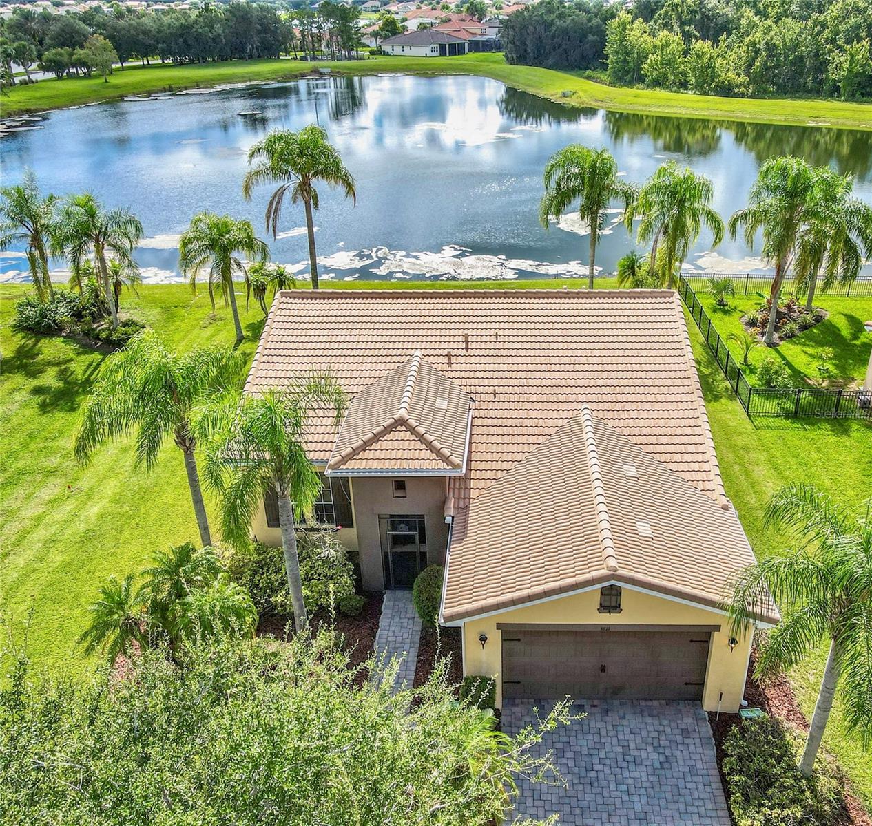 Proudly presenting this 2046 sq.ft. former model home with 3 bedrooms, 2 baths situated on a larger lot with beautiful pond and conservation views in the resort style community of Bellalago. The owners have taken meticulous care of this vacation home only used several months a year. This Luca floor plan has over $50,000 in builder upgrades including 8ft doors throughout, upgraded tile set on a diagonal pattern, 42in kitchen cabinets, granite countertops, glass insert front door, screened front and back lanai. Updates include 2022 AC, freshly landscaped, recently power washed and is ready for the new owner to add their personal touch. This home offers everything for work, entertaining and relaxation all under one roof. The award-winning lakefront front community of Bellalago is a 24 hr guard gated community with many things to offer including state-of-the-art fitness centers, multiple pools, parks, tennis, volleyball, basketball, walking and biking trails, dog parks, boat ramps leading to world class bass fishing on Lake Tohopekaliga, fishing pier, daily fitness classes and a restaurant on the lake. Furniture is being offered on a separate agreement. Call to schedule a private showing.
