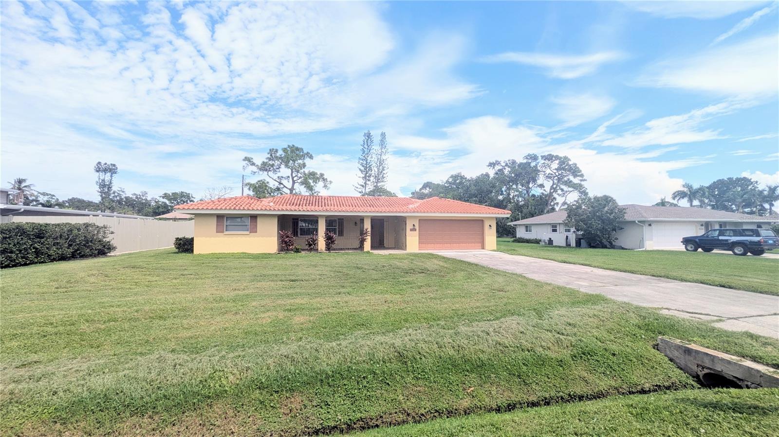 **RENT REDUCED** This ANNUAL UNFURNISHED, well-maintained home is spacious and filled with Florida sunshine from abundant windows. The new kitchen features solid wooden cabinetry, a slab granite countertop with a breakfast bar, a custom subway tile backsplash, and new stainless steel appliances. The kitchen is open to the dining area and living room. The interior has just been painted. The flooring has diagonal tile flooring throughout, so NO CARPETING. The location is superb, close to Siesta Key (1/2 mile to the beaches), in a quiet neighborhood, and conveniently near shopping, dining, and downtown Sarasota. The yard is very large and partially fenced. The extra-roomy two-car garage houses the laundry and additional storage. Call today for your place in the Florida sunshine!