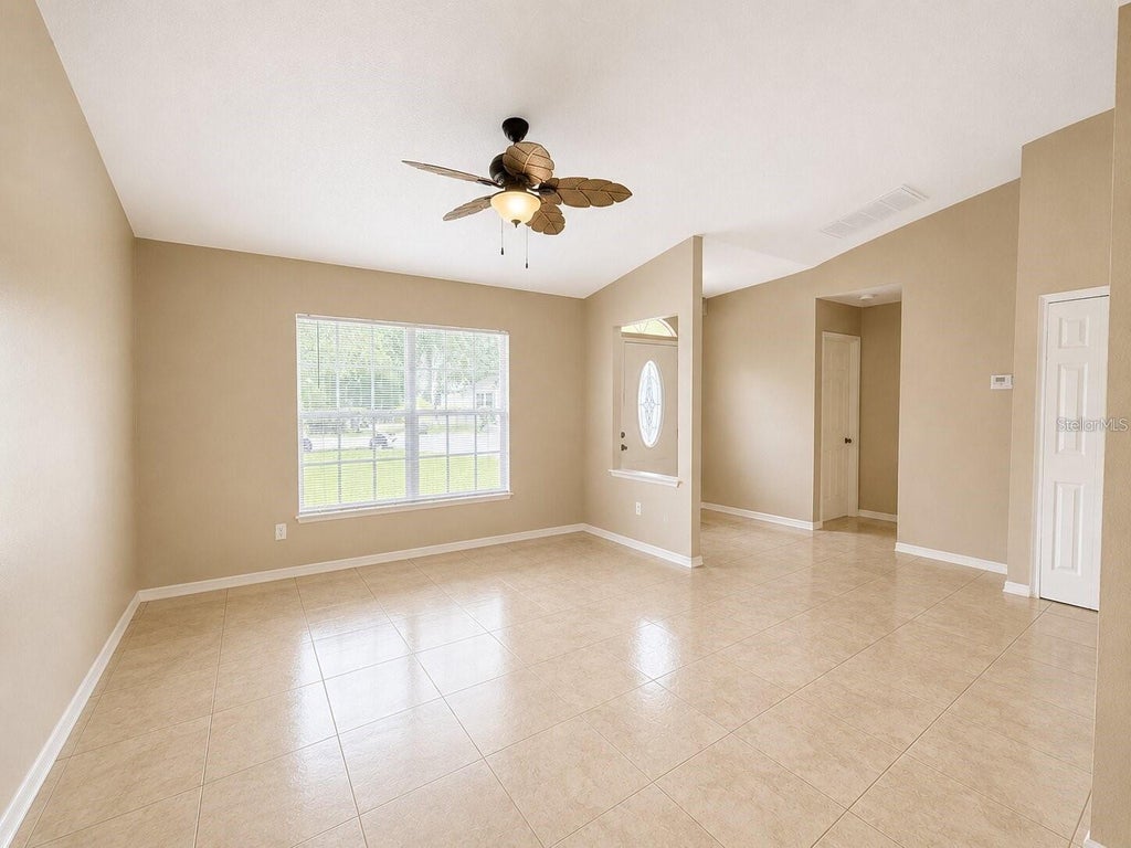 Photo of 907 Hendon Place, Kissimmee, FL 34758 (MLS # O6431381)