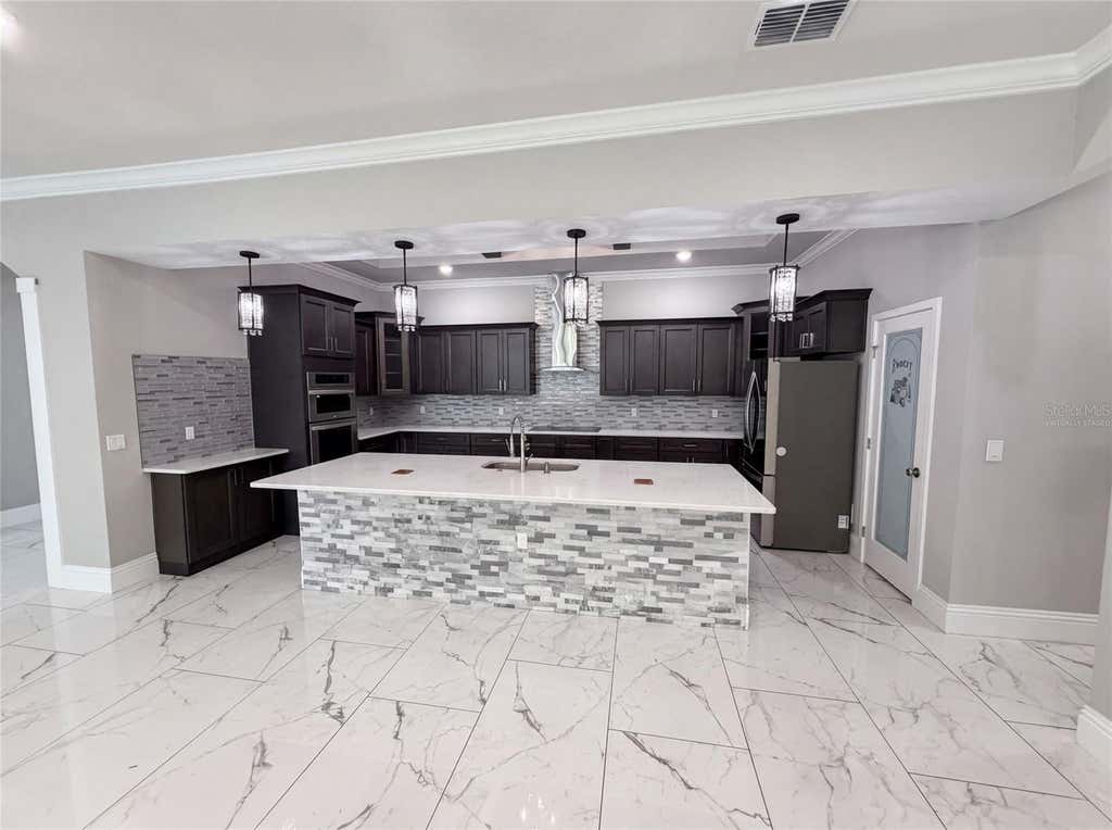 Photo of 20797 Racine Street, Orlando, FL 32833 (MLS # O6434004)