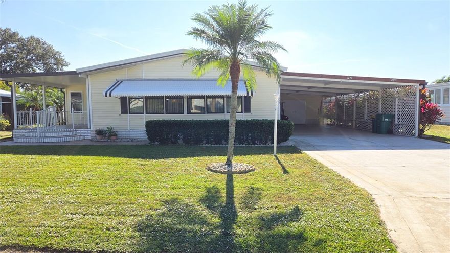 Discover true Florida living in this beautifully updated home featuring 2 large bedrooms, 2 full baths, and an upgraded kitchen with a spacious walk-in pantry. Enjoy 1,920 sq ft under air (includes Workshop of 288 sq ft) plus a new sunroom wired for a mini-split, would bring the total space to 2217 sq ft . New luxury vinyl floors, a 4-ton A/C (installed 8/25), metal roof, indoor laundry, and a semi-private backyard with 19 palms and fruit trees make this home move-in ready. The oversized 76x100 deeded lot includes a 20x42 carport/garage and a 288 sq ft workshop under air. Resort-style amenities include a gated private oceanfront beach with restroom, showers & picnic tables, you can also relax on the 750' gated private fishing pier, 18-hole golf course, 3 heated pools, pickleball, mini golf, great dining, medical and banking facilities, plus nearby shopping and waterfront restaurants. You're not just buying a home—you're buying an incredible lifestyle!