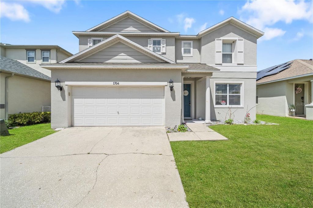 Photo of 1704 Pine Ridge Drive, Davenport, FL 33896 (MLS # O6378623)