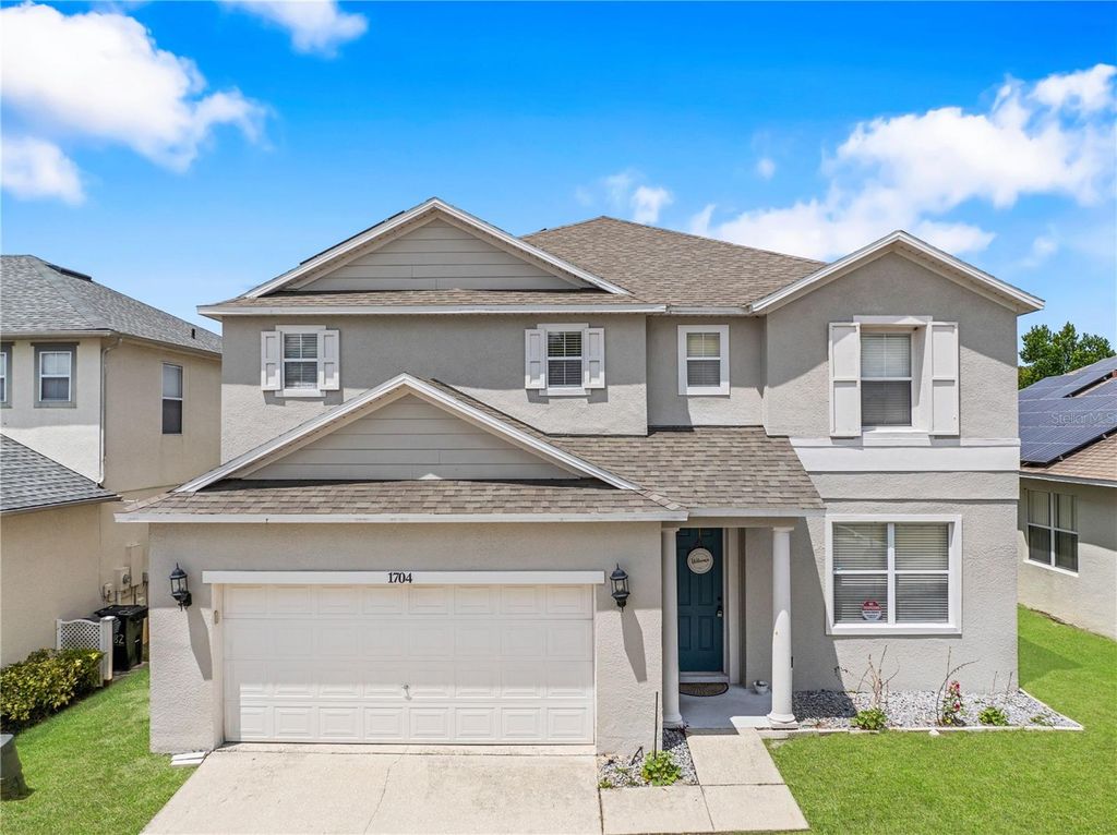 Photo of 1704 Pine Ridge Drive, Davenport, FL 33896 (MLS # O6378623)