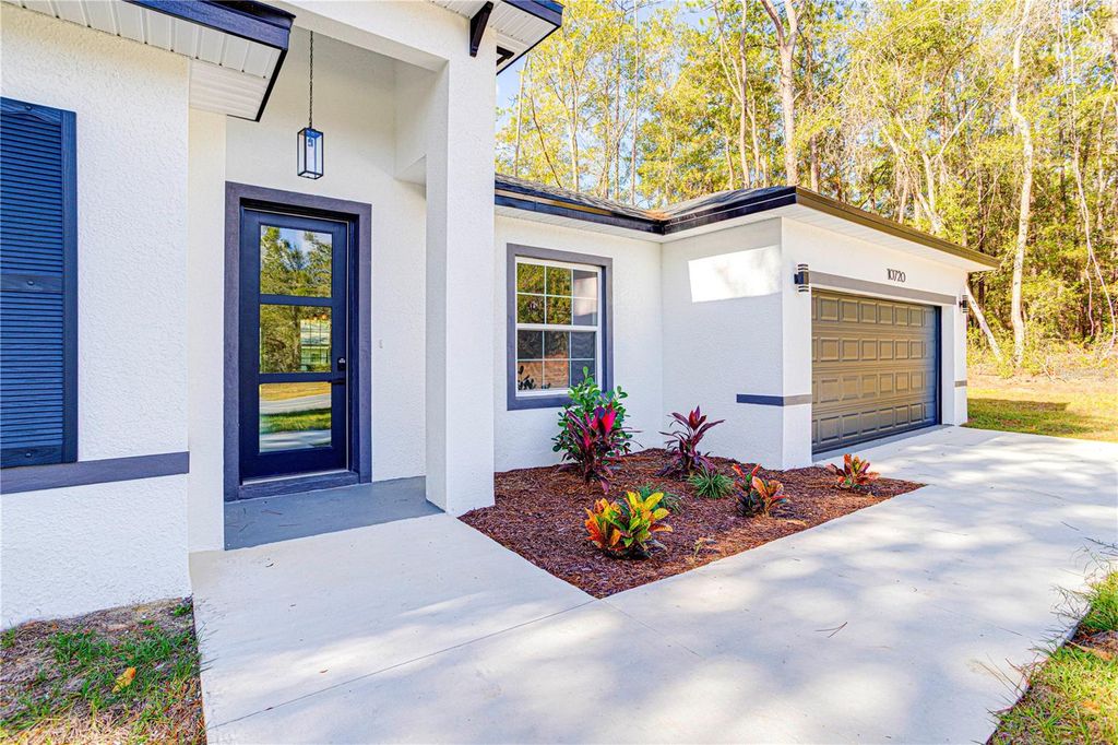 Photo of 10720 N Citrus Springs Boulevard, Citrus Springs, FL 34434 (MLS # O6369212)