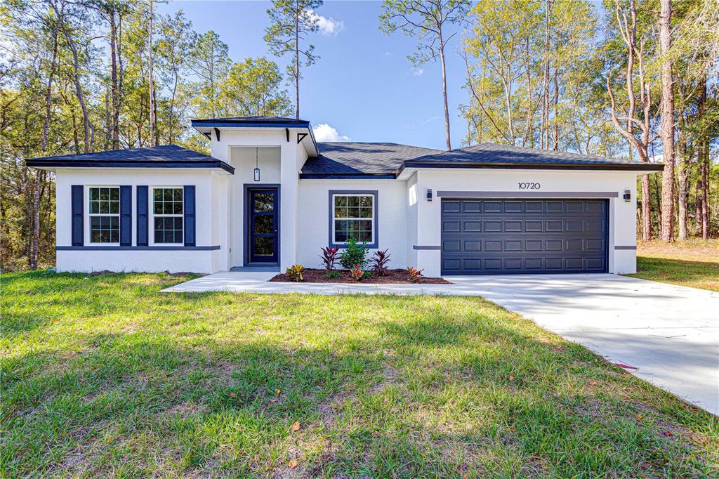 Photo of 10720 N Citrus Springs Boulevard, Citrus Springs, FL 34434 (MLS # O6369212)