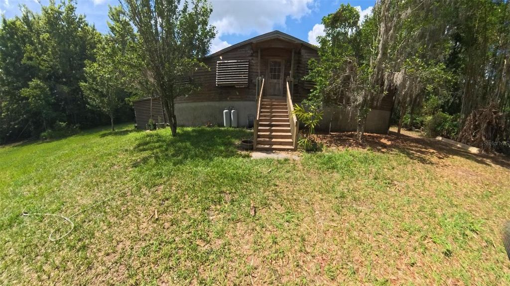 Photo of 2501 Gator Lane, Groveland, FL 34736 (MLS # OM725485)