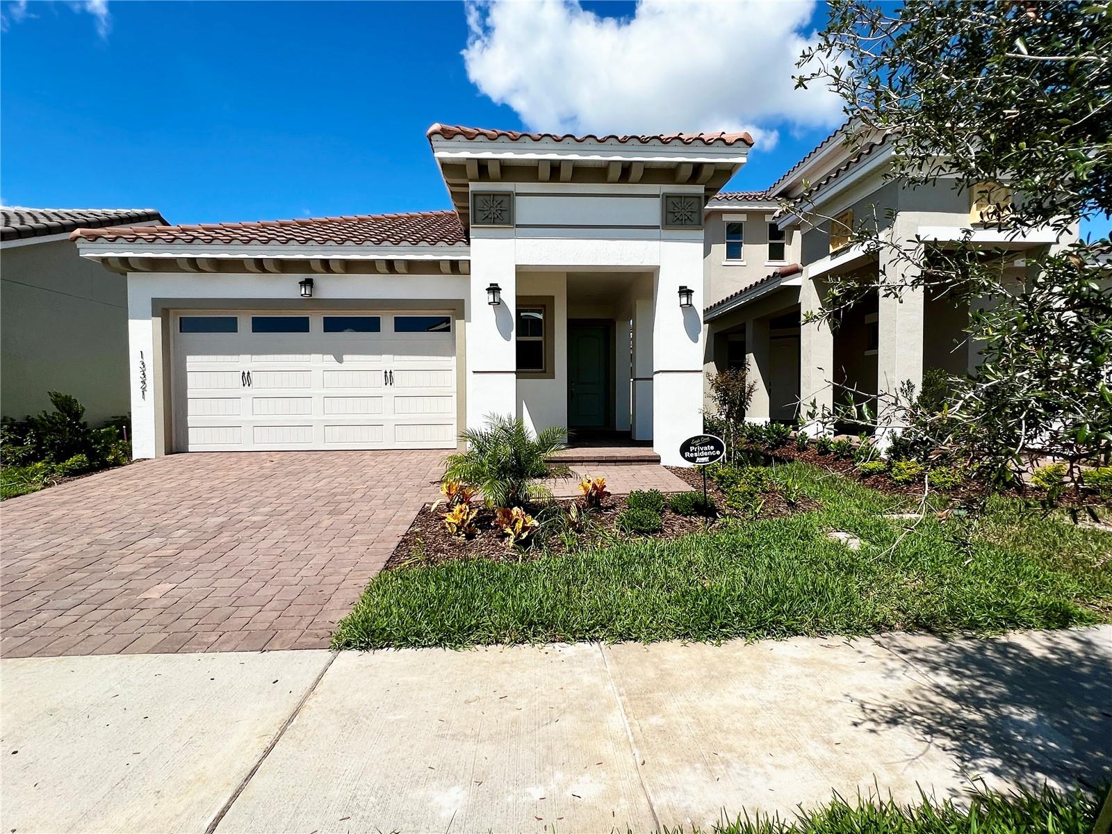 WOW!! NO CARPETS ALL TILE!!! Top Rated LAKE NONA GATED GOLF Community!!! This Amazing Brand New home with 3 large bedrooms and 2 bathrooms within Lake Nona in Eagle Creek(Golf and country club). This home checks off all of the boxes! Enormous kitchen with an Island that you normally see in a Multi-Million Dollar home with waterfall counters!. It's truly an entertaining Kitchen with tons of natural light and open flow plan. The Living space is open to a large covered Lanai with a quadruple sliding glass door which opens up the home. This is one of those modern plans that says "Yes I'm home" The Home comes equipped with an open floor plan and two bedrooms towards the front of the home with a super large master with a master bathroom that is fit for luxury at it's best! Your Friends and family will be wowed! Its big enough for a game of duck-duck-goose or perhaps a game of laser tag. The Community is gated and has 4 gates complete with an amazing Golf course which is open to the public, tennis courts, pickleball, basketball, a full fitness center gym, a golf academy, pools, and a clubhouse that you can reserve for any events you may have...I believe I am missing some amenities as there are so many to choose from... Don't miss this one reach out to schedule today!