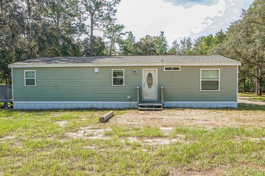 Turnkey 3-bed, 2-bath home on 5.11 acres in Bronson, FL. Fully renovated with updated kitchen, baths, flooring, new siding (2023) and roof (2023?2024). Brand new well and septic (inspection passed, fully pumped). Fenced, mowed 1-acre yard with 4 acres of wooded privacy. City-approved subdivision potential for 1-acre parcels ideal for investors or expansion.
