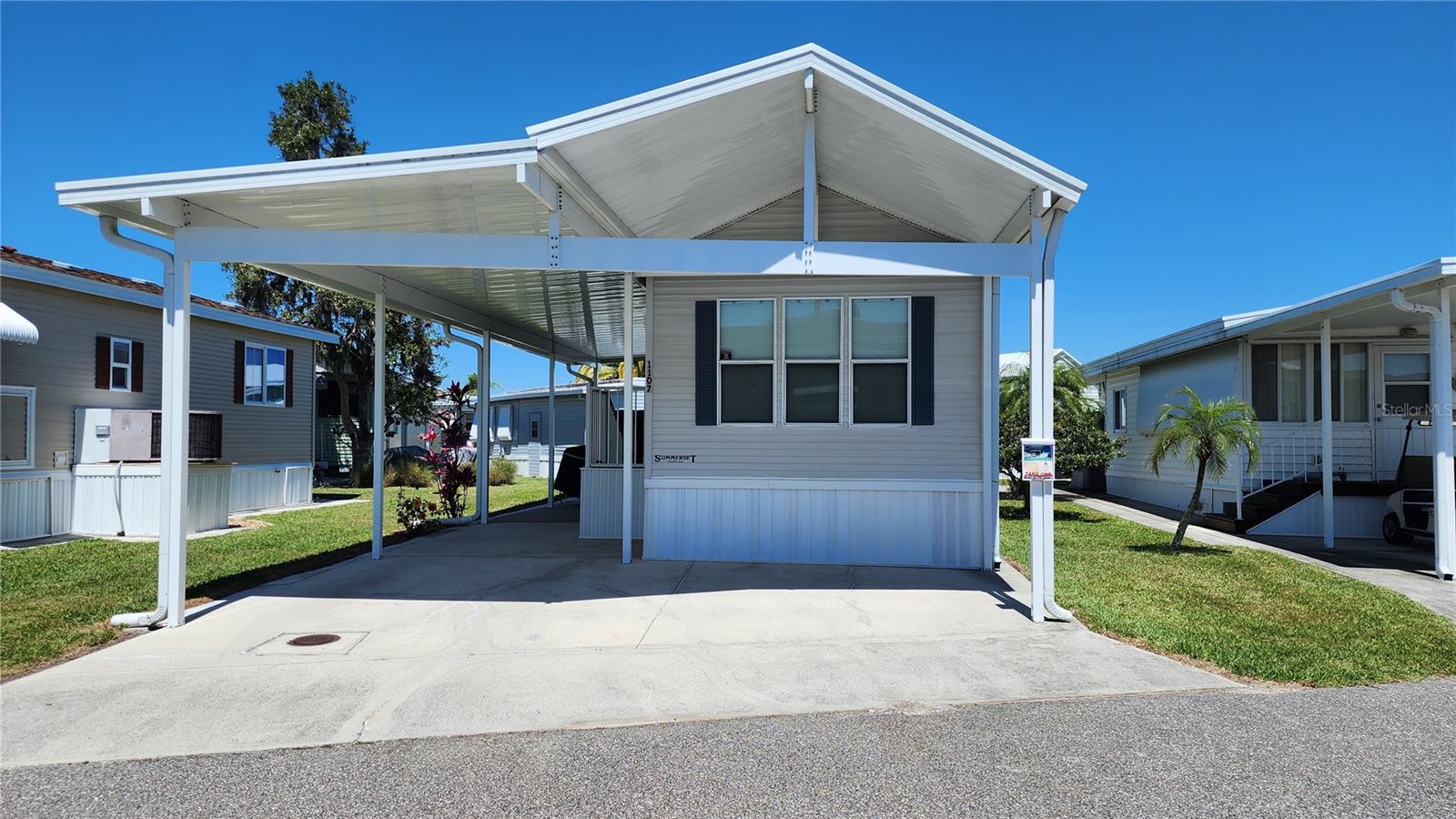 UPDATED SINGLE WIDE MOBILE HOME IN ACTIVE 55+ COMMUNITY! Stay warm in Florida in this furnished and well-kept home with one bed, one full bath, and large carport. The bedroom has a large built-in closet. The bathroom has a tub/shower and linen storage. There is a stacker washer/dryer. The carport gives plenty of covered parking and could also be used as a patio area. Shingle roof (2020). Central A/C (2016). Hot water heater (2023). The community of Sugar Creek Country Club features two swimming pools, heated spa, tennis & pickleball, shuffleboard, fitness room, club house, workshop, and an active social calendar during the winter months. LOW HOA FEES of just $525 quarterly which includes water, trash, sewer, basic cable, internet, and grass mowing. Enjoy this community's proximity to the Braden River and River Links Golf Course. Sorry this is not a dog lot.