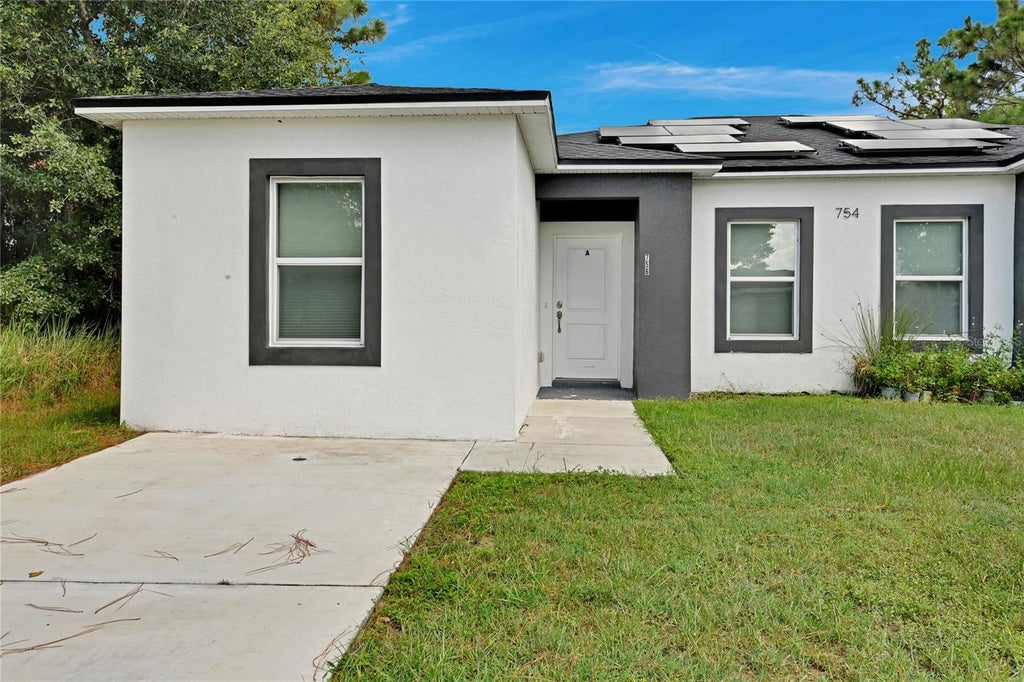 Photo of 754 Mink Ct #A, Kissimmee, FL 34759 (MLS # S5156383)