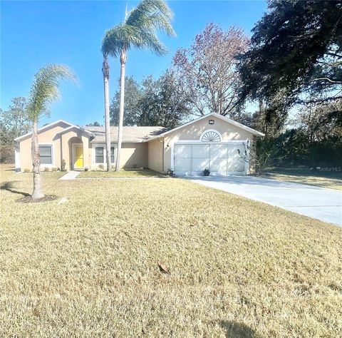 Photo of 119 Pine Grove Drive, Palm Coast, FL 32164 (MLS # A4679722)